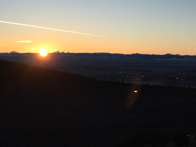 This was taken just after getting up and over the western rim on the first climb. Time it right and you'll see the sun kiss the Tetons.