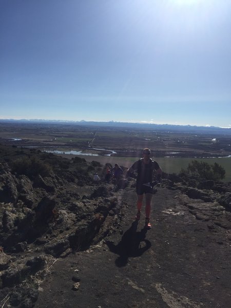 A group of runners climb up to "slickrock" on the southern rim.