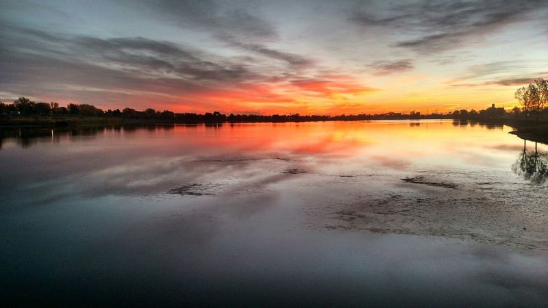 The sun rises over Jim Baker Reservoir.