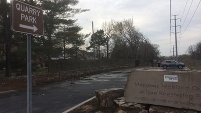 Front park sign at the park entrance and parking lot.