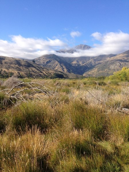 The Remarkables poke through the clouds.