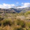 The Remarkables poke through the clouds.