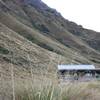 The Fern Burn Hut is a welcome sight after a long day on the trail.