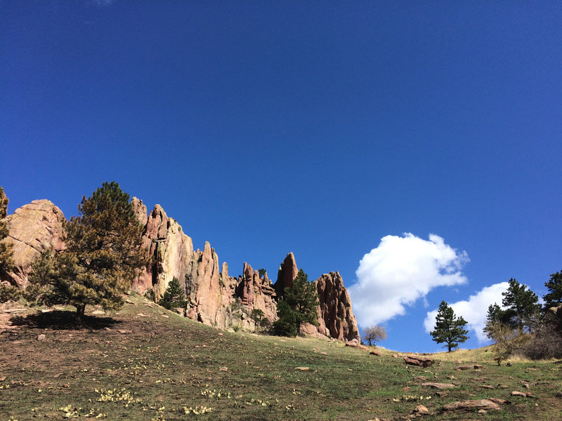 The Red Rocks tower above as you approach from the Canyon Blvd parking lot.