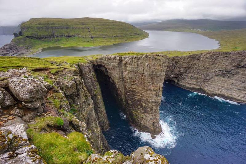 The view of Leitisvatn Lake from the southernmost cliffs of Vágar Island is unbelievable - you truly have to see it to believe it.