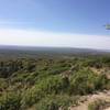 From the Frejole Trail, enjoy nice views looking out onto the highway that runs north and south near the Guadalupe Mountains.