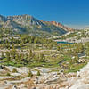 Looking across Middle Fork Basin towards Piute Crags (orange) with Topsy Turvy Lake in the distance.