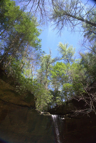 Copperas Falls cascades from high above in the dense forests of the Red River Gorge.