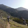 Hikers at Thelma and Louise rock early in the morning.