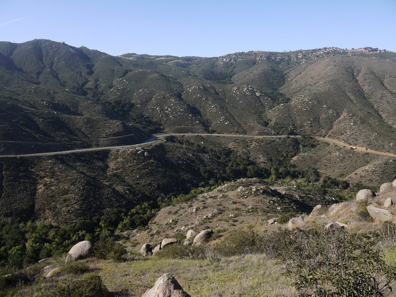 San Pasqual Valley Road snakes through San Pasqual Canyon above the San Dieguito river bed.