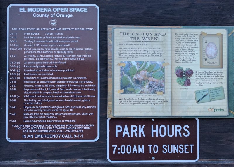An informative kiosk provides park rules, regulations, and general info about the area's flora/fauna.
