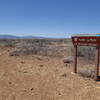 Look for this sign to make sure you're at the right parking area for Pueblo La Plata.