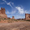 Three Gossips (R), Sheep Rock (C), and Courthouse Tower (L).