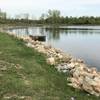 A cement dock on the Blue Trail looking over Argonne Lake and towards the prairie on the Orange Trail.