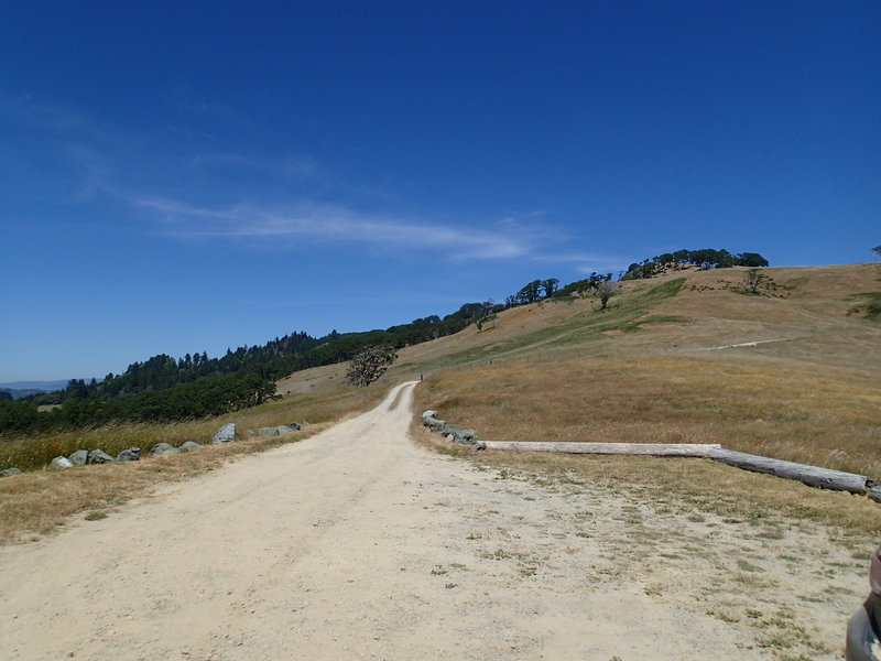 Lyons Ranch Trail extends into the distance from the parking area.