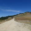 Lyons Ranch Trail extends into the distance from the parking area.