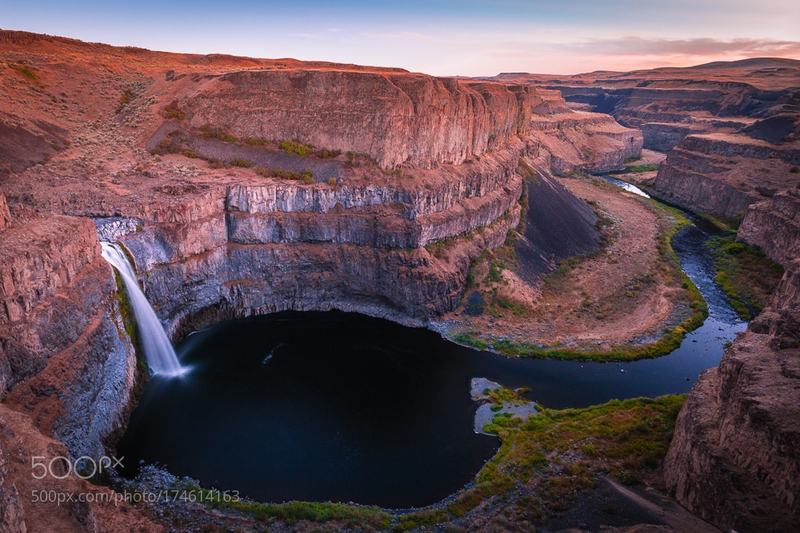 The sun sets over Palouse Falls.