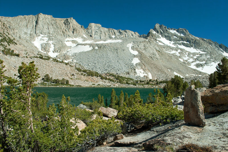 Moonlight Lake sits at the feet of towering granite cliffs.