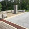 Stone benches create a place to rest your feet and enjoy some sunshine.