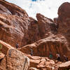 The group heads up a section of tumbled steps in the Fiery Furnace.