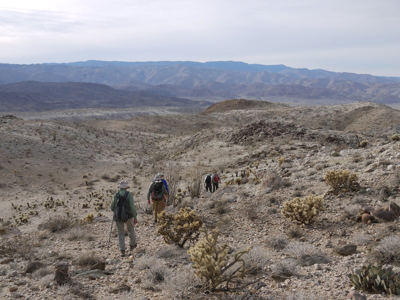 Monday Maniacs begin the descent from Mine Peak.