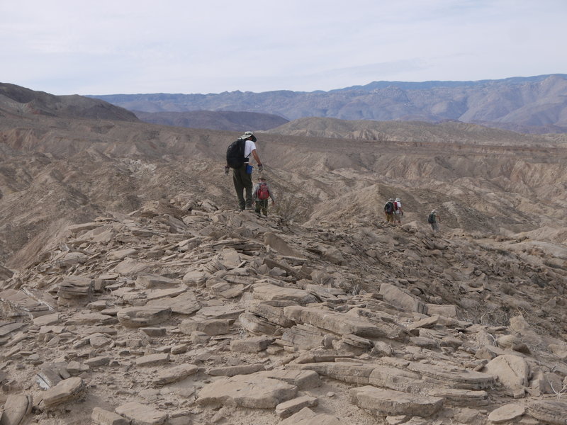 Monday Maniacs traverse the start of the ridge leading to the ramp to Mine Peak.