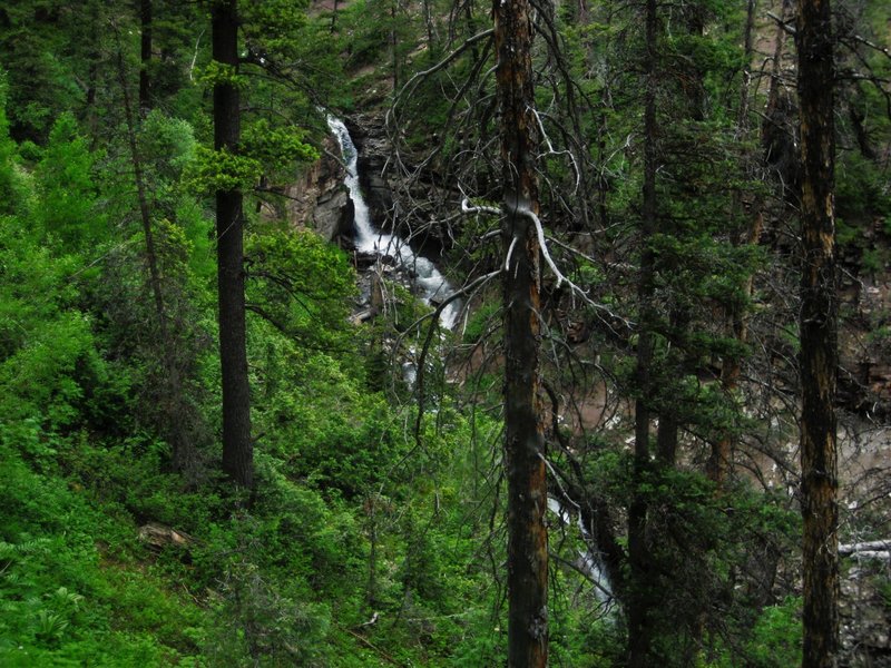 Raging waterfalls pock Oak Creek early in the spring. This one creates a particularly challenging creek crossing.