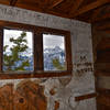 Inside the boardinghouse, you can still catch a glimpse of Potosi Peak.