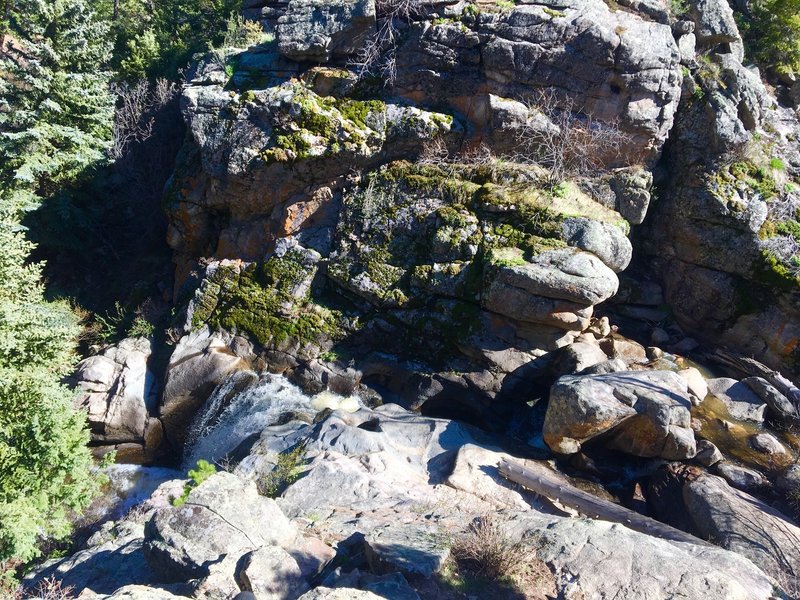 A waterfall cascades through Forsythe Canyon.