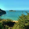 Coquille Bay and Fisherman Island can both be seen from the Abel Tasman Track.