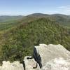 This rock outcropping provides an excellent vantage point overlooking the nearby tree covered hills.