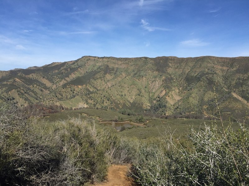 Frog Pond can be seen below from the overlooking West Ridge.