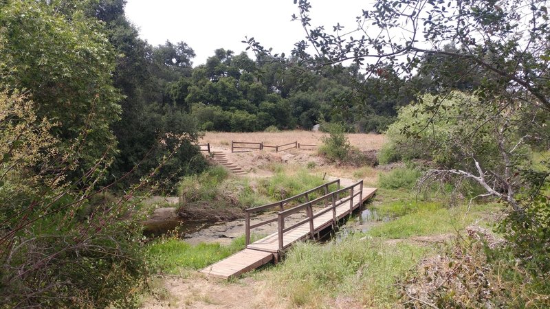 A footbridge aids your crossing near the Tenajas.