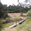 A footbridge aids your crossing near the Tenajas.