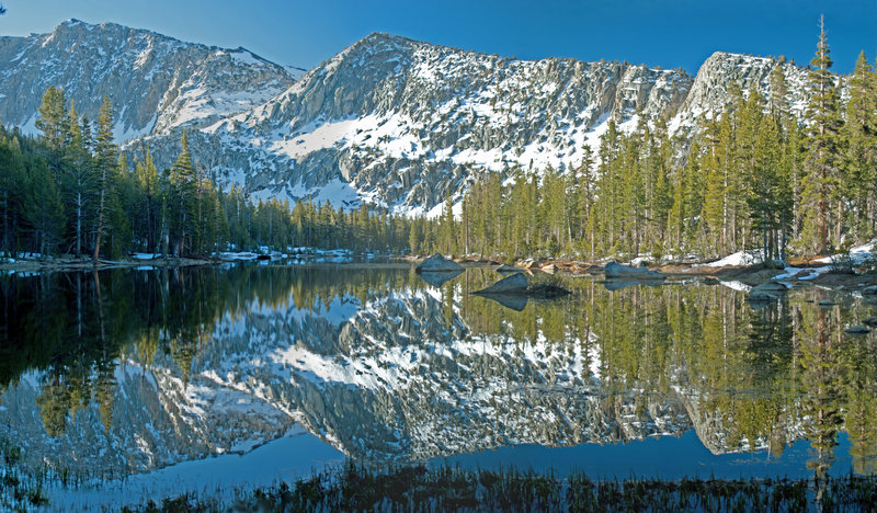 Lower McGuire Lake with the summit of Blackcap Mountain on the left side.