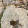 Perfectly round depressions on this boulder may have been a spot where the Kumeyaay Indians ground acorns from the nearby live Oaks.