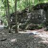 These rock cliffs provide an interesting change of scenery near the first creek crossing.