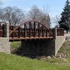 A steel bridge aids your passage over this drainage.