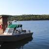 A park ranger's boat stands moored at the dock in Windigo.