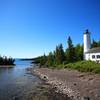 Rock Harbor Lighthouse Isle Royale National Park Copyright Ray Dumas (https://goo.gl/tHcW1y) under CC BY-SA (https://creativecommons.org/licenses/by-sa/2.0/legalcode).