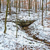 A small alcove hides under a snowy blanket along the Buffalo Creek Trail.