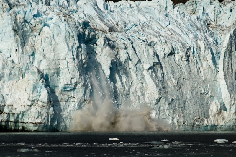 Ice calves off of the Margerie Glacier. Photo credit: NPS Photo.