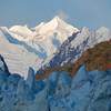 Sunrise hits the Fairweather Mountains above the Margerie Glacier. Photo credit: NPS Photo.