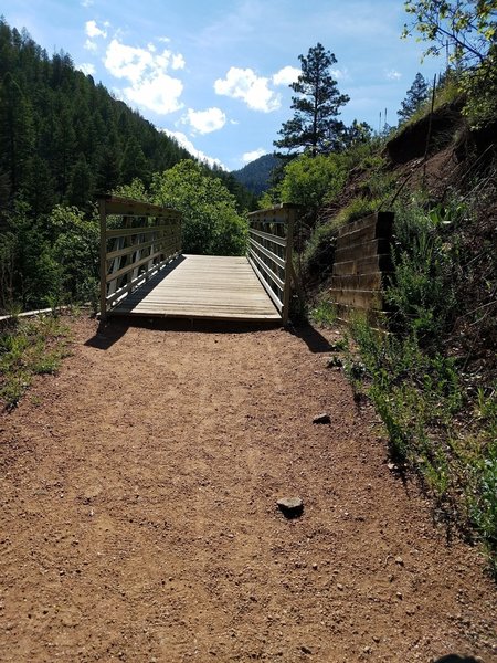 Bridge near Mid-Columbine Trailhead. The trail narrows and gets steeper directly after bridge.