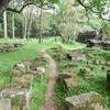 The Baphuon Temple trail wanders past scattered stones.