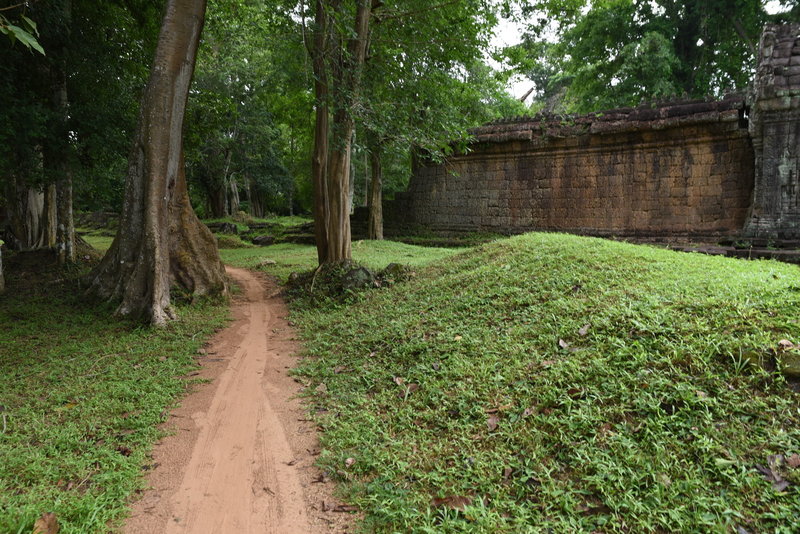 The Preah Khan Trail winds through low grass covered mounds as it loops.