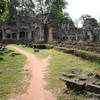 Crumbling walls and pillars make for a surreal scene on the Preah Khan Trail.