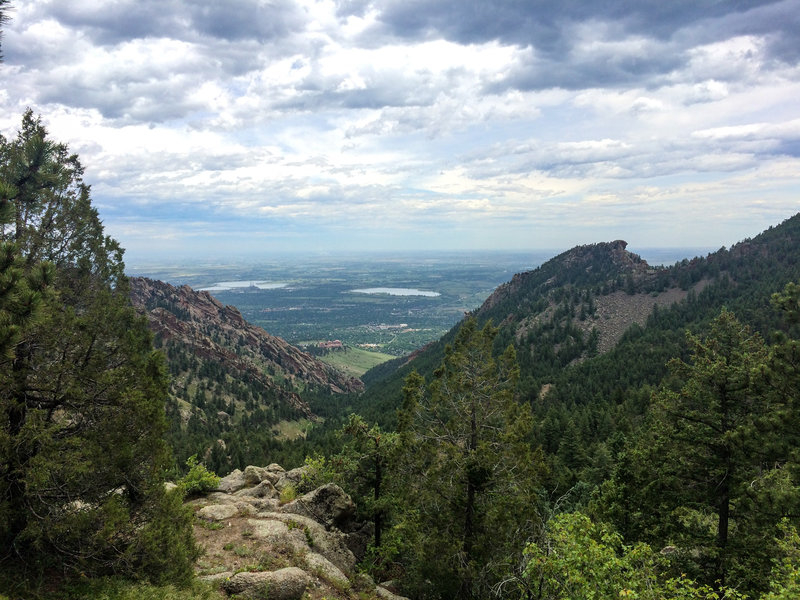 The NCAR trailhead can be seen far below.