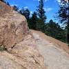 The trail requires climbing over rock slabs and sure footing as you navigate its loose sections.