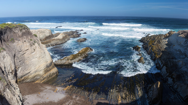 Cliffs provide a great view of the coast on the Bluff Trail.